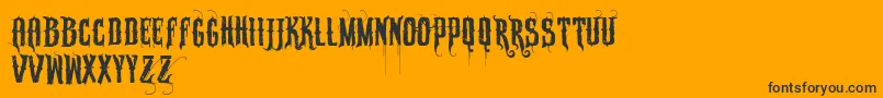 Vtkssabonete Font – Black Fonts on Orange Background