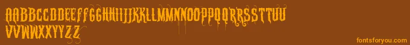 Vtkssabonete Font – Orange Fonts on Brown Background