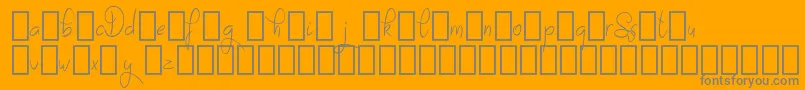 SayesDemo-Schriftart – Graue Schriften auf orangefarbenem Hintergrund