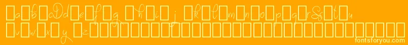 SayesDemo-Schriftart – Gelbe Schriften auf orangefarbenem Hintergrund