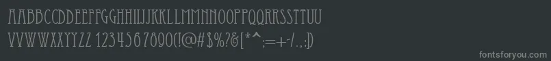 フォントEssediai – 黒い背景に灰色の文字
