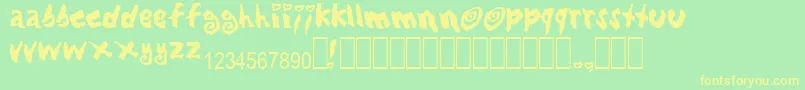 LovingBabes Font – Yellow Fonts on Green Background