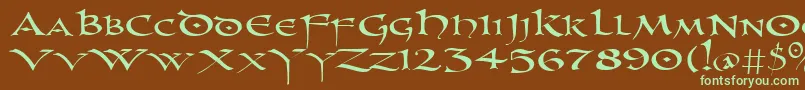 フォントUncl – 緑色の文字が茶色の背景にあります。