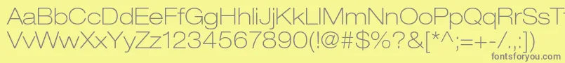 HelveticaneueltstdThex-Schriftart – Graue Schriften auf gelbem Hintergrund