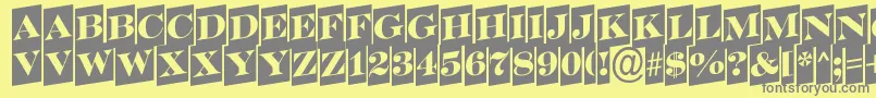 SerifertitulcmupRegular-fontti – harmaat kirjasimet keltaisella taustalla