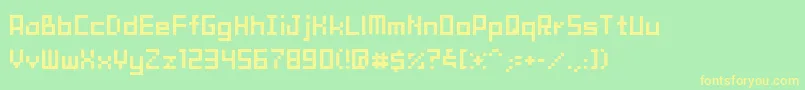 TamaMini02-Schriftart – Gelbe Schriften auf grünem Hintergrund