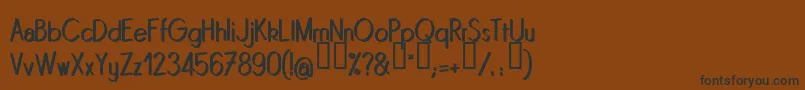Quinrg Font – Black Fonts on Brown Background