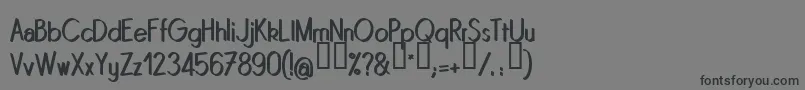Quinrg Font – Black Fonts on Gray Background