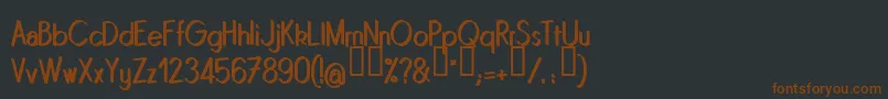 Quinrg Font – Brown Fonts on Black Background
