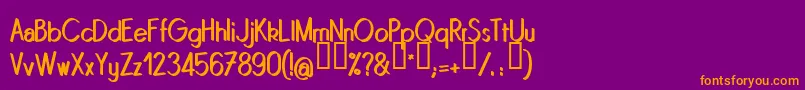 Quinrg-fontti – oranssit fontit violetilla taustalla