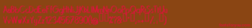 Quinrg Font – Red Fonts on Brown Background