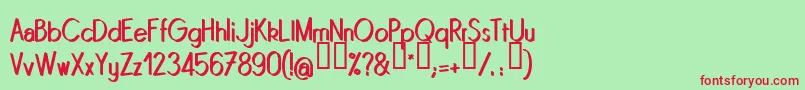Quinrg Font – Red Fonts on Green Background