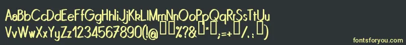フォントQuinrg – 黒い背景に黄色の文字