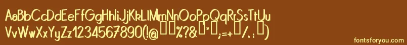 フォントQuinrg – 黄色のフォント、茶色の背景