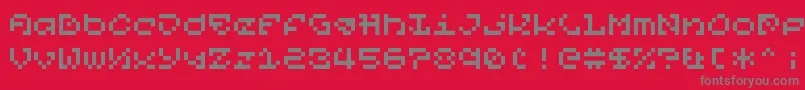 フォントPixelOrGtfo – 赤い背景に灰色の文字