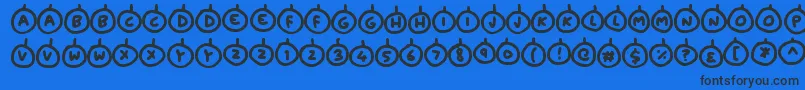 fuente Baubles – Fuentes Negras Sobre Fondo Azul