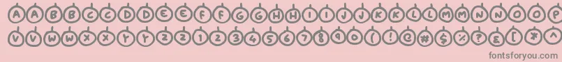 フォントBaubles – ピンクの背景に灰色の文字