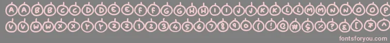フォントBaubles – 灰色の背景にピンクのフォント
