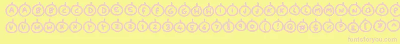 Baubles-Schriftart – Rosa Schriften auf gelbem Hintergrund