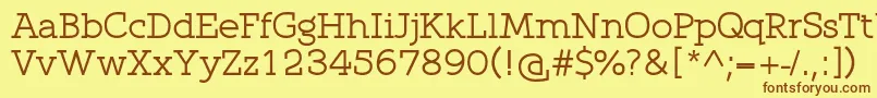 フォントQlarendon – 茶色の文字が黄色の背景にあります。