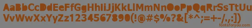 フォントDreamerEternal – 茶色の文字が灰色の背景にあります。