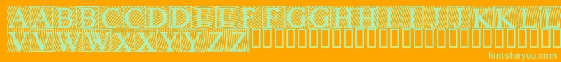 Lowengravedcapsdark-Schriftart – Grüne Schriften auf orangefarbenem Hintergrund