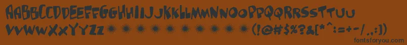Gluttonman Font – Black Fonts on Brown Background