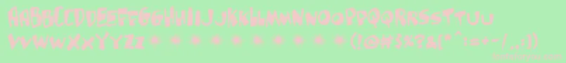 Gluttonman Font – Pink Fonts on Green Background