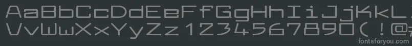 フォントLarabiefontxtBold – 黒い背景に灰色の文字