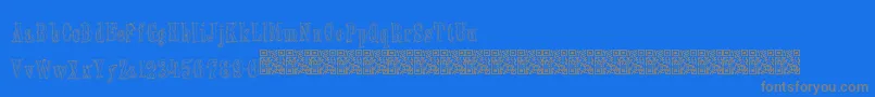 フォントOldebarnsby – 青い背景に灰色の文字