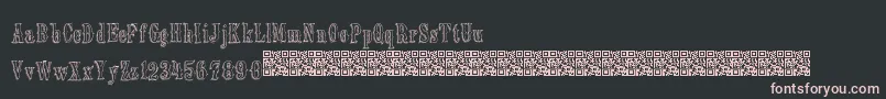 フォントOldebarnsby – 黒い背景にピンクのフォント