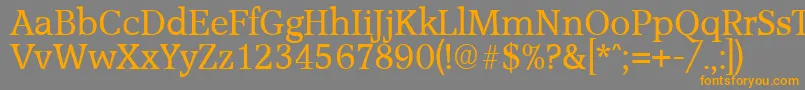 フォントAccoladeSerialRegularDb – オレンジの文字は灰色の背景にあります。