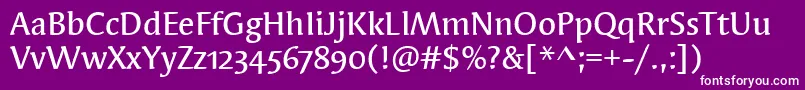 SyndorMdOsItcTtMedium-fontti – valkoiset fontit violetilla taustalla