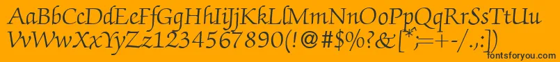 ZabriskiescriptRegular-Schriftart – Schwarze Schriften auf orangefarbenem Hintergrund