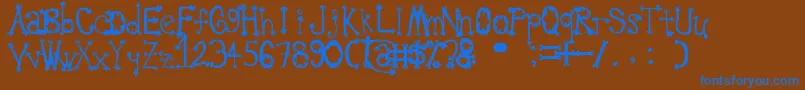 OldieSplatLyngam Font – Blue Fonts on Brown Background