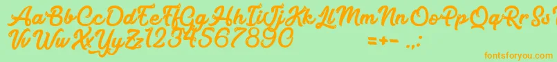 MagicCandy Font – Orange Fonts on Green Background