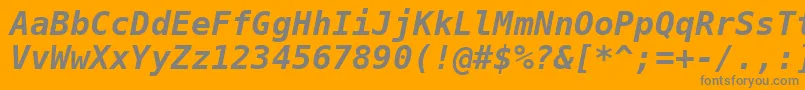 Czcionka Dejavusansmono Boldoblique – szare czcionki na pomarańczowym tle