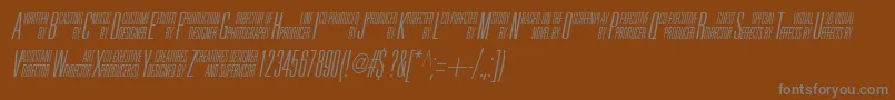 フォントUniAccItalic – 茶色の背景に灰色の文字