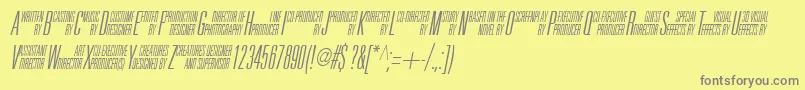 フォントUniAccItalic – 黄色の背景に灰色の文字