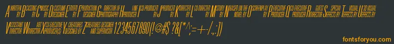 フォントUniAccItalic – 黒い背景にオレンジの文字