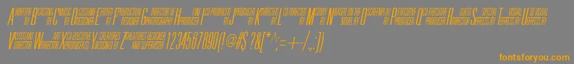 フォントUniAccItalic – オレンジの文字は灰色の背景にあります。