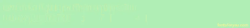 フォントEclipticlight – 黄色の文字が緑の背景にあります