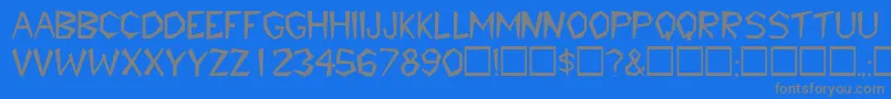 TribaldisplaycapssskRegular Font – Gray Fonts on Blue Background