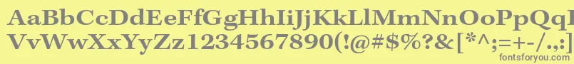 KeplerstdSemiboldextcapt-fontti – harmaat kirjasimet keltaisella taustalla