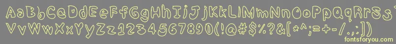 Shrimp Font – Yellow Fonts on Gray Background