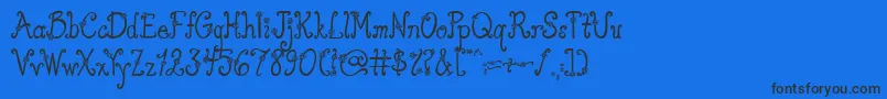 AustieBostYouWearFlowersSolid Font – Black Fonts on Blue Background