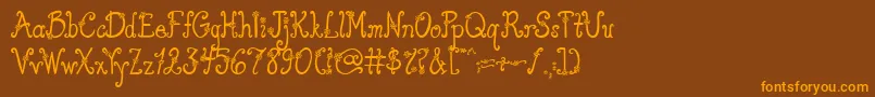 AustieBostYouWearFlowersSolid Font – Orange Fonts on Brown Background