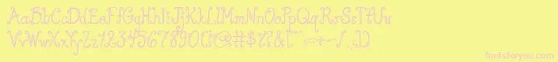 AustieBostYouWearFlowersSolid-fontti – vaaleanpunaiset fontit keltaisella taustalla