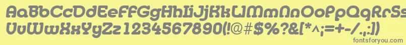 フォントMediaBoldItalic – 黄色の背景に灰色の文字