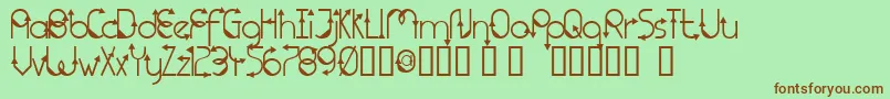 TmThatWayNormal Font – Brown Fonts on Green Background